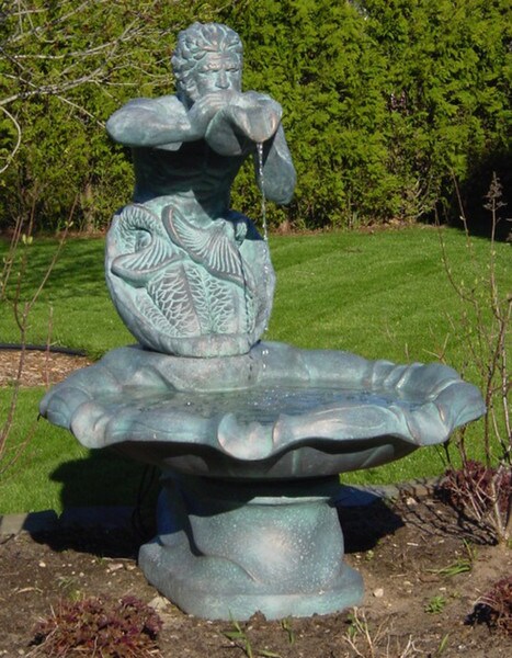 God Fountain Nepturne Triton summons the seas by trumpeting his shell